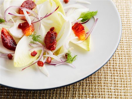 red endive - Winter salad of chicory, blood orange, pomegranate and red onion Stock Photo - Premium Royalty-Free, Code: 659-07609751