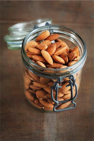 seeds and nuts - Almonds in storage jar Stock Photo - Premium Royalty-Free, Code: 659-07609880