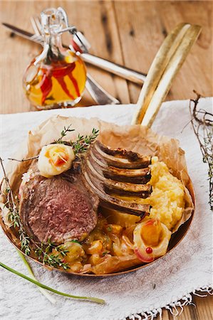 Cooked rack of lamb with chutney and polenta Stock Photo - Premium Royalty-Free, Code: 659-07609912