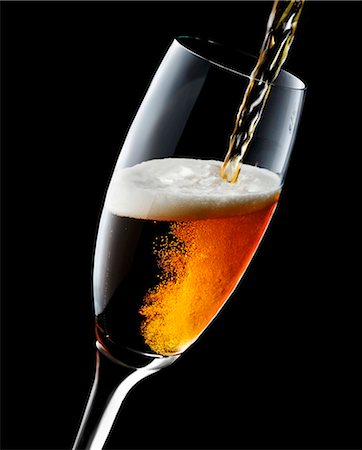 pouring drink - Cold Beer Pouring From a Bottle into a Glass; Overflowing Stock Photo - Premium Royalty-Free, Code: 659-07610066