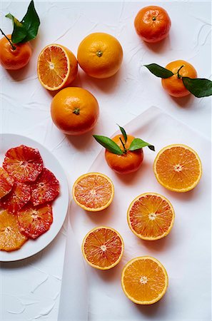 fruit still life - Oranges and clementines Foto de stock - Sin royalties Premium, Código: 659-07610114