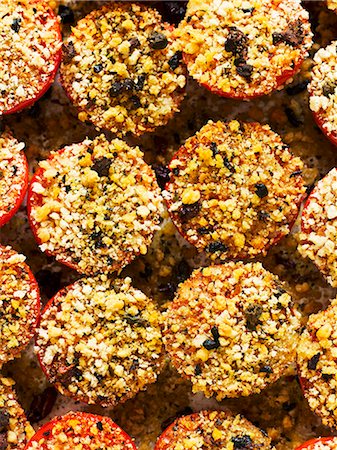 roasted tomatoes above - Roasted tomatoes topped with an olive and breadcrumb crust Stock Photo - Premium Royalty-Free, Code: 659-07610257