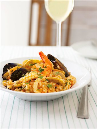 shrimp plate - Risotto alla pescatora (rice with seafood, Italy) Stock Photo - Premium Royalty-Free, Code: 659-07610310