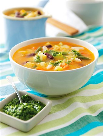 simsearch:659-08419175,k - Soupe au pistou (vegetable soup with basil pesto, France) Stock Photo - Premium Royalty-Free, Code: 659-07610311