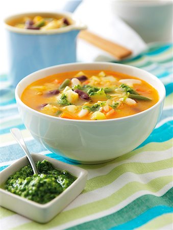 simsearch:659-01850563,k - Soupe au pistou (vegetable soup with basil pesto, France) Stock Photo - Premium Royalty-Free, Code: 659-07610311