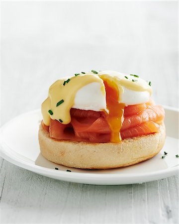 simsearch:659-06373352,k - Egg Royale (a roll topped with smoked salmon and a poached egg) Stock Photo - Premium Royalty-Free, Code: 659-07610326