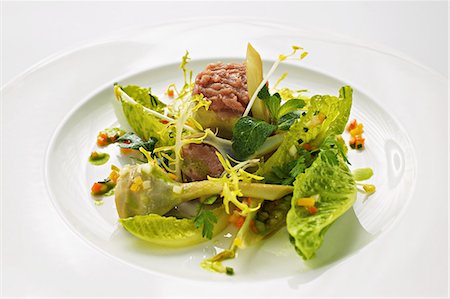 salad prepared plates - Stuffed artichokes with veal tartar and cos lettuce Stock Photo - Premium Royalty-Free, Code: 659-07610335