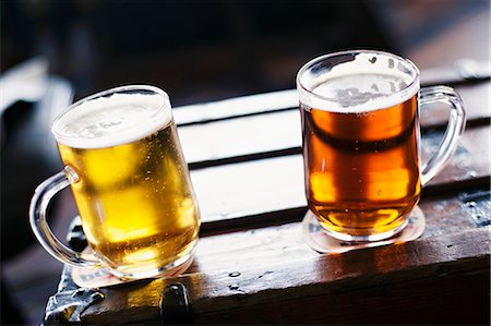 simsearch:659-08903410,k - Two types of beer in tankards Photographie de stock - Premium Libres de Droits, Code: 659-07610358