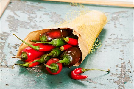 A paper bag of fresh chilli peppers Stock Photo - Premium Royalty-Free, Code: 659-07738672