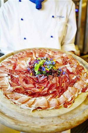 sausage still life - A chef serving a ham platter Stock Photo - Premium Royalty-Free, Code: 659-07738964