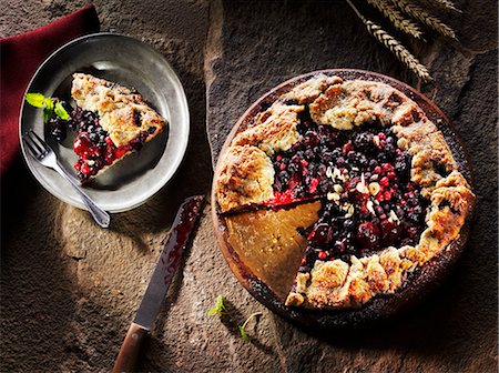 fruit cake top view - A berry-nut tart, sliced Stock Photo - Premium Royalty-Free, Code: 659-07739084