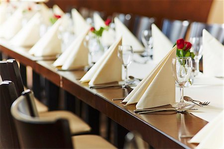 A table laid for a wedding reception in a restaurant Stock Photo - Premium Royalty-Free, Code: 659-07739331