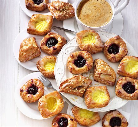 Various Danish pastries served with coffee Stock Photo - Premium Royalty-Free, Code: 659-07739389