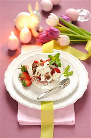 spring easter not isolated not people - Cookies and cream with strawberries for Easter Stock Photo - Premium Royalty-Free, Code: 659-07739444