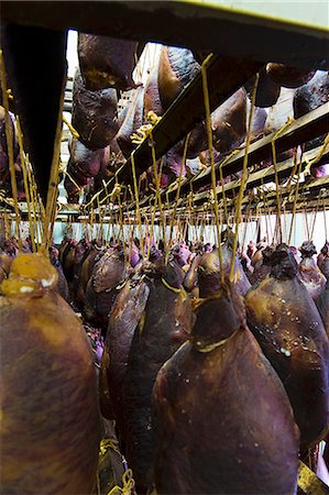 Hams hanging up to dry Stock Photo - Premium Royalty-Free, Code: 659-07739467