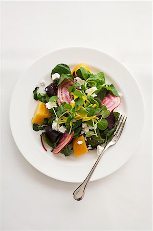 salad overhead - Beetroot and golden beet salad with watercress and goat's cheese Stock Photo - Premium Royalty-Free, Code: 659-07739488