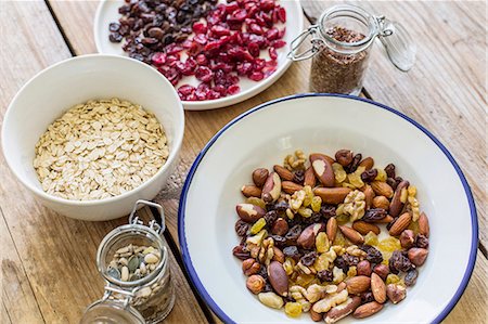 seeds and nuts - Nuts, seeds, oats and dried berries Stock Photo - Premium Royalty-Free, Code: 659-07739536