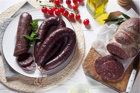 sausage still life - An arrangement of various different black puddings Stock Photo - Premium Royalty-Free, Code: 659-07739626