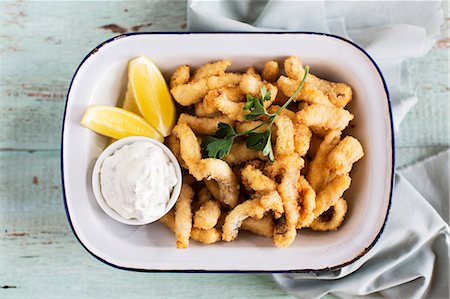 deep fried - Haddock fillets with tatare sauce and lemons Stock Photo - Premium Royalty-Free, Code: 659-07739720