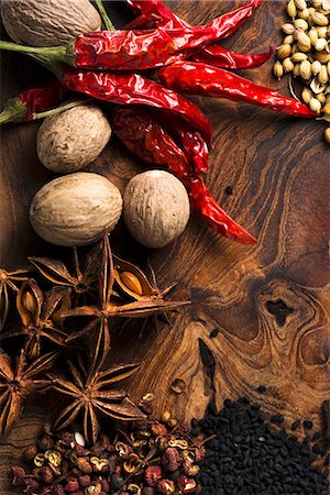 spice still life - Assorted spices on wooden board Stock Photo - Premium Royalty-Free, Code: 659-07739929
