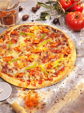 peperoncini - A minced meat and jalapeño pizza Stock Photo - Premium Royalty-Free, Code: 659-07958511