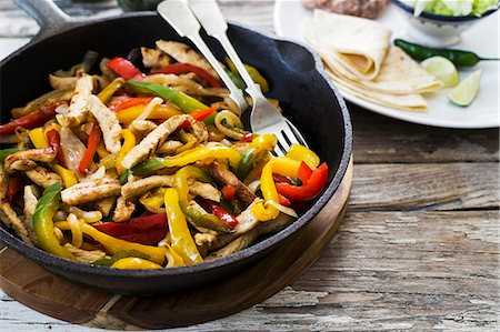 poultry recipe - Chicken fajita with peppers Stock Photo - Premium Royalty-Free, Code: 659-07958936