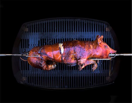 simsearch:659-07958278,k - A suckling pig being grilled Photographie de stock - Premium Libres de Droits, Code: 659-07959054