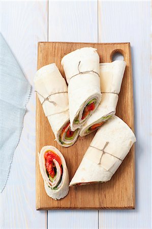 Ham, cheese and tomato wraps Foto de stock - Sin royalties Premium, Código: 659-07959140