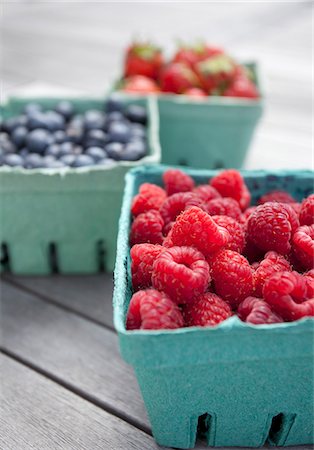 Fresh berries in green paper punnets Stock Photo - Premium Royalty-Free, Code: 659-07959230