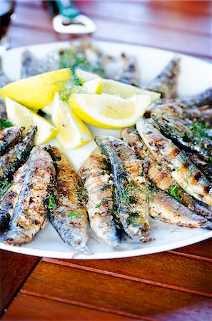 simsearch:659-07598844,k - Grilled sardines with lemons and fresh fennel Stock Photo - Premium Royalty-Free, Code: 659-07959266