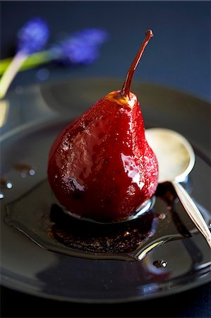 pear dessert - A poached pear in red wine Stock Photo - Premium Royalty-Free, Code: 659-07959295