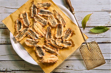 Acciughe fritte (fried anchovy fillets, Italy) Stock Photo - Premium Royalty-Free, Code: 659-07959353