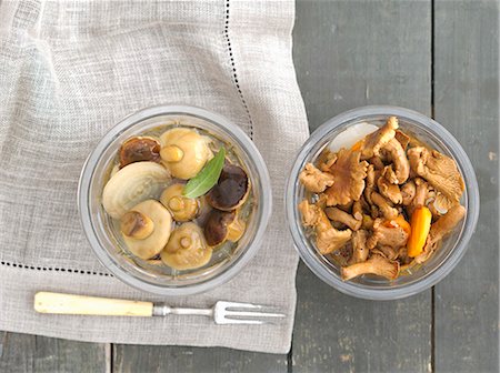 fork - Preserved bay boletes and chanterelle mushrooms Stock Photo - Premium Royalty-Free, Code: 659-07959595