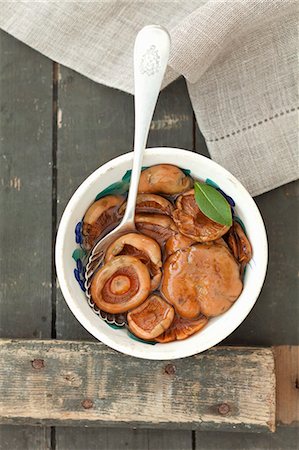 spoon on table nobody - Preserved red pine mushrooms Stock Photo - Premium Royalty-Free, Code: 659-07959590