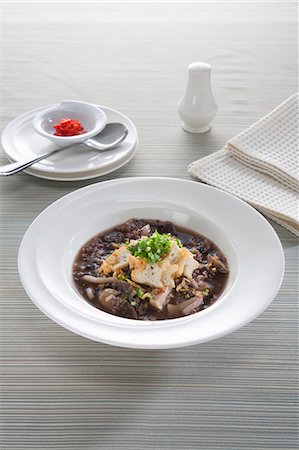 Porridge with grains, shiitake mushrooms and tofu (Asia) Stockbilder - Premium RF Lizenzfrei, Bildnummer: 659-07959732