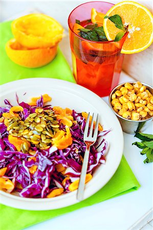 Red cabbage salad with oranges and pumpkin seeds Stock Photo - Premium Royalty-Free, Code: 659-07959785
