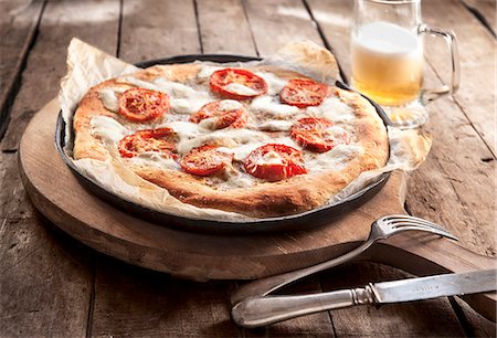 Margherita pizza and beer Stock Photo - Premium Royalty-Free, Code: 659-08146996