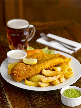 simsearch:659-08940625,k - Fish and chips with sauces and beer in a pub Stock Photo - Premium Royalty-Free, Code: 659-08147151