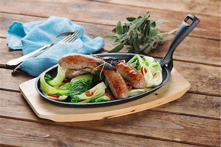 Sausages with bok choy and sage Stock Photo - Premium Royalty-Free, Code: 659-08147270