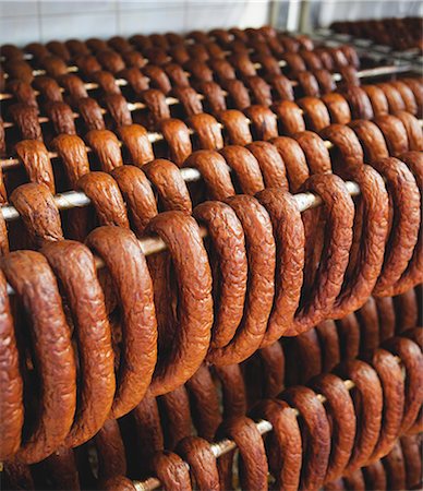 simsearch:659-07959458,k - Lots of sausages hanging on a metal rack Stockbilder - Premium RF Lizenzfrei, Bildnummer: 659-08147435