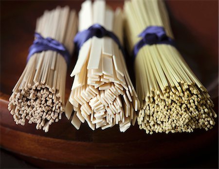 photograph of still life - Three bundles of soba and udon noodles Stock Photo - Premium Royalty-Free, Code: 659-08147477