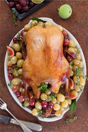 roast poultry - Roast duck with grapes and figs Stock Photo - Premium Royalty-Free, Code: 659-08147594