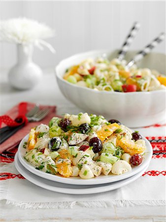 salad prepared plates - A fruity pasta salad with olives Stock Photo - Premium Royalty-Free, Code: 659-08147766