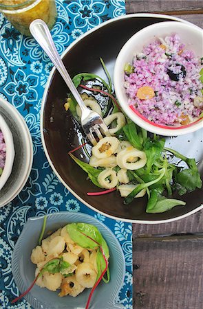 sepia toned - Couscous with purple cauliflower and fried squid rings Stock Photo - Premium Royalty-Free, Code: 659-08147827