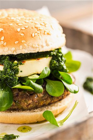 simsearch:659-07597180,k - A vegetarian burger with a bean patty, chimi-churri, halloumi and lamb's lettuce Stock Photo - Premium Royalty-Free, Code: 659-08147981