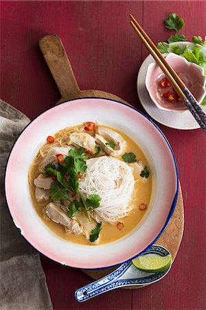 south east asian cooking - Chicken soup with rice noodles (Thailand) Stock Photo - Premium Royalty-Free, Code: 659-08148048