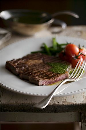 Grilled rib-eye steak with a herb sauce Stock Photo - Premium Royalty-Free, Code: 659-08148143