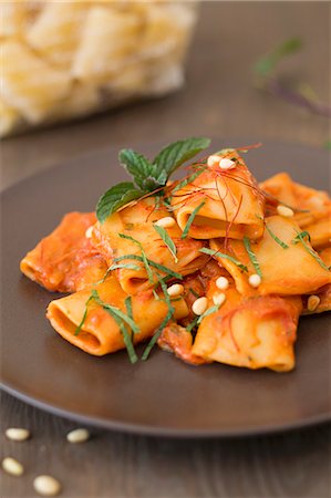 pepper mint - Paccheri with a tomato and ricotta sauce and pine nuts Stock Photo - Premium Royalty-Free, Code: 659-08148226