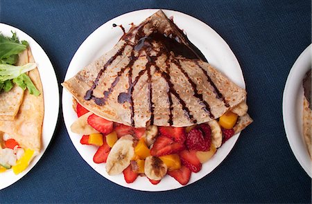 pancake top view - Crepes with fruit and chocolate sauce (Mexican Street food in Los Angeles, USA) Stock Photo - Premium Royalty-Free, Code: 659-08418735