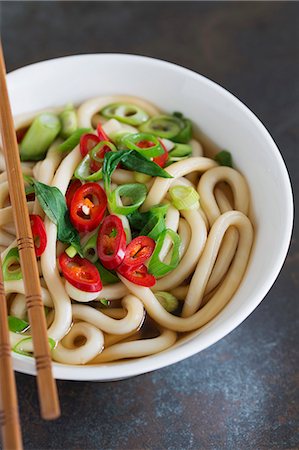 simsearch:659-06185365,k - Udon noodle soup with spring onions and chilli rings (Japan) Stock Photo - Premium Royalty-Free, Code: 659-08418804